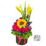 Box Cilindro 7 Rosas + Girasol + Lirio