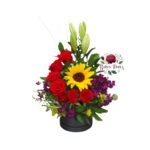Box Cilindro 7 Rosas + Girasol + Lirio